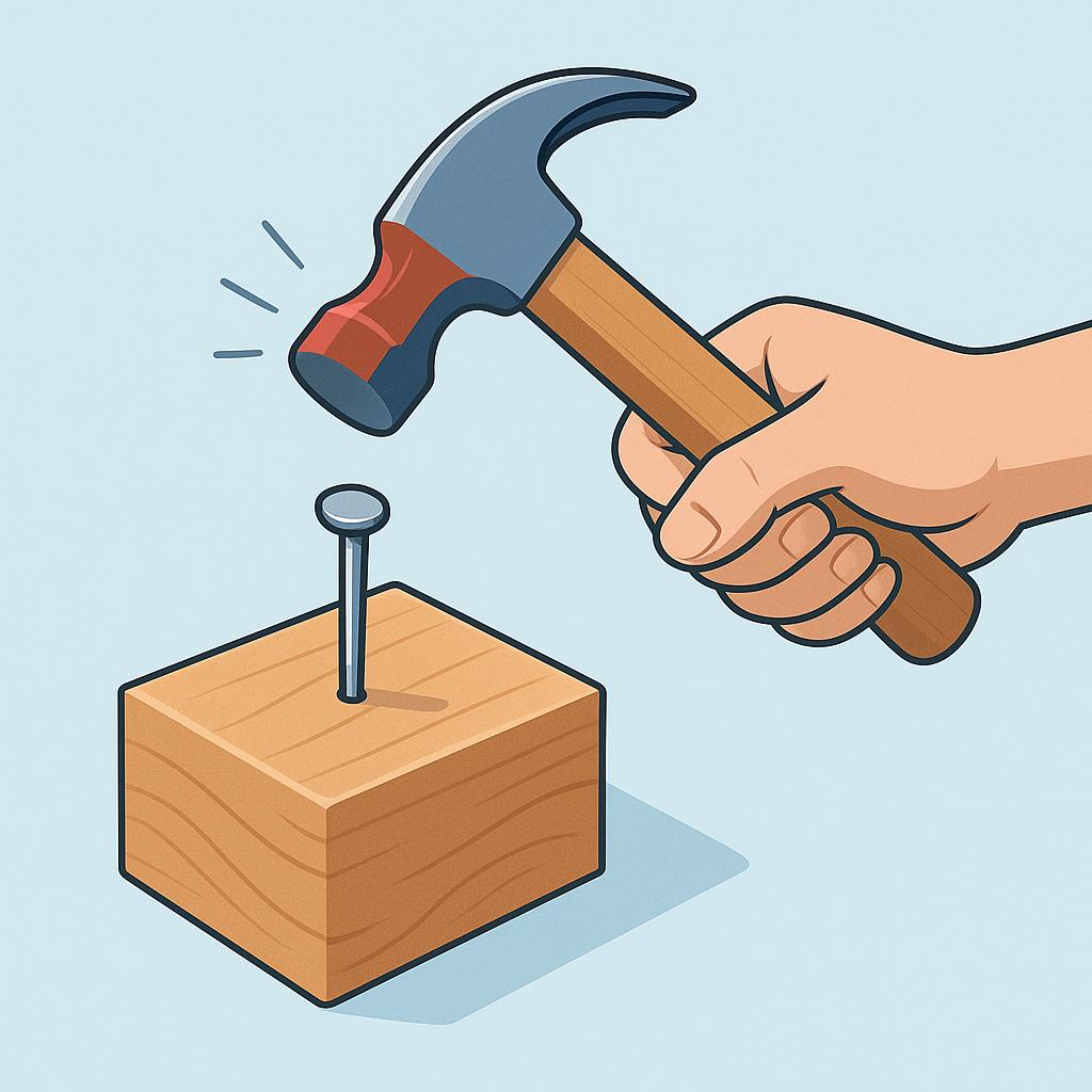 A close-up view of a person's hand firmly gripping a hammer and striking a nail into a piece of wood.