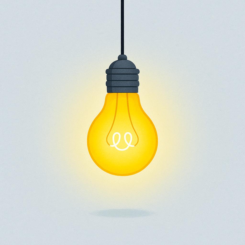 A bright, glowing yellow light bulb hanging from a cord against a dark background, indicating it is illuminated.