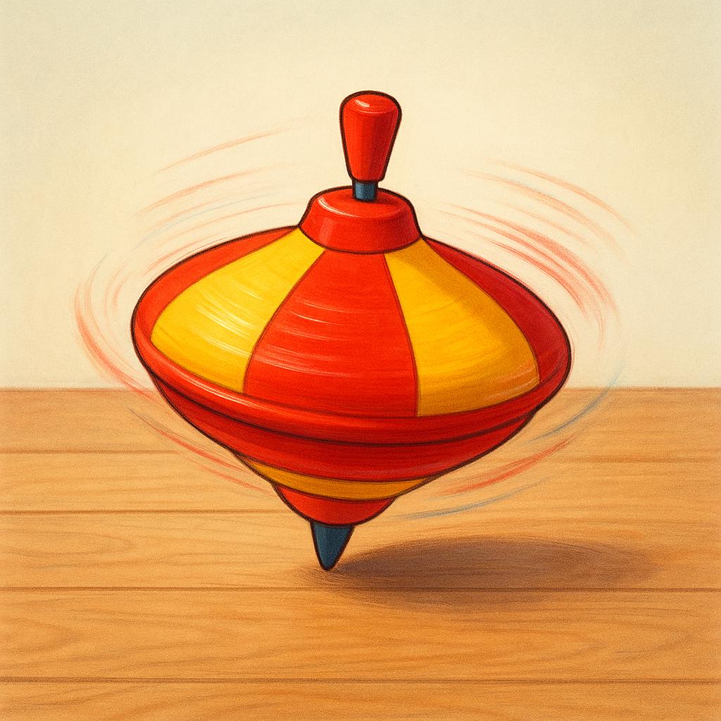 A colorful toy top spinning rapidly on a flat surface, illustrating rotation.