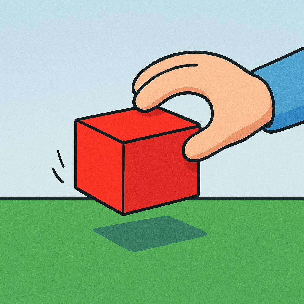 A simple cartoon hand is lifting a small, bright red box off a flat green table, illustrating the action of removing an object from a surface.