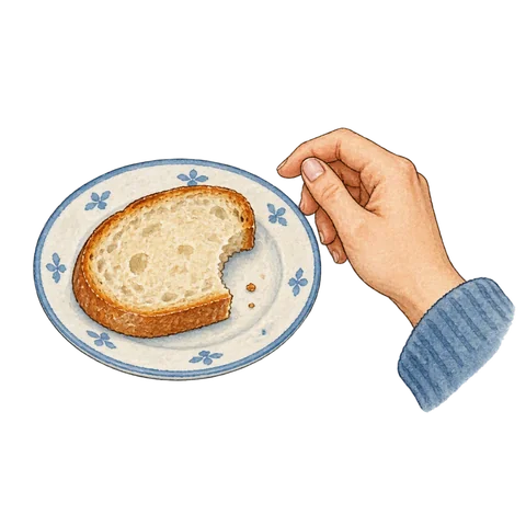 A tiny plate holding a slice of bread with one easy bite already taken, a relaxed satisfied hand nearby